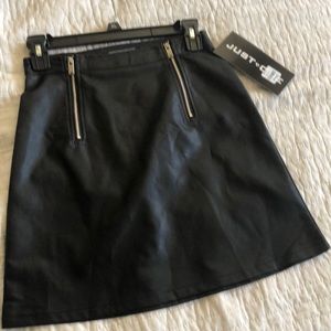 Black polyester leather looking skirt